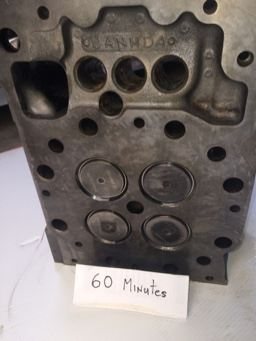 Cat cylinder head combustion face after sixty minutes, bare cast iron