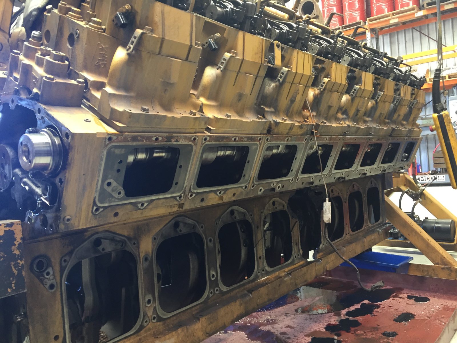 Cat 3516 block with eight crankcase handhole covers along one bank