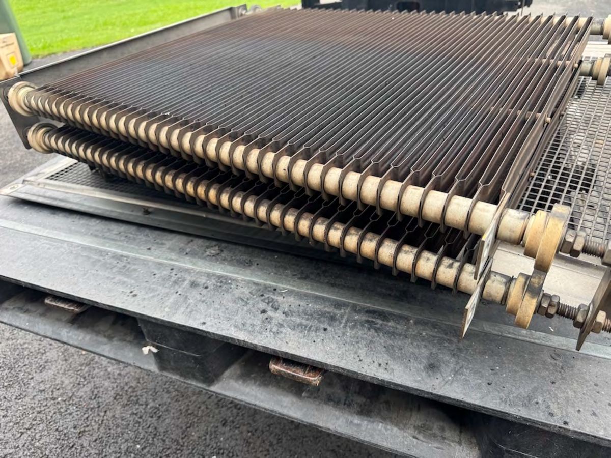 Rail vehicle grid assemblies photographed for a cleaning trial