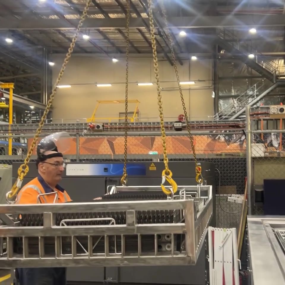 Clip: craning a loaded basket onto the platform