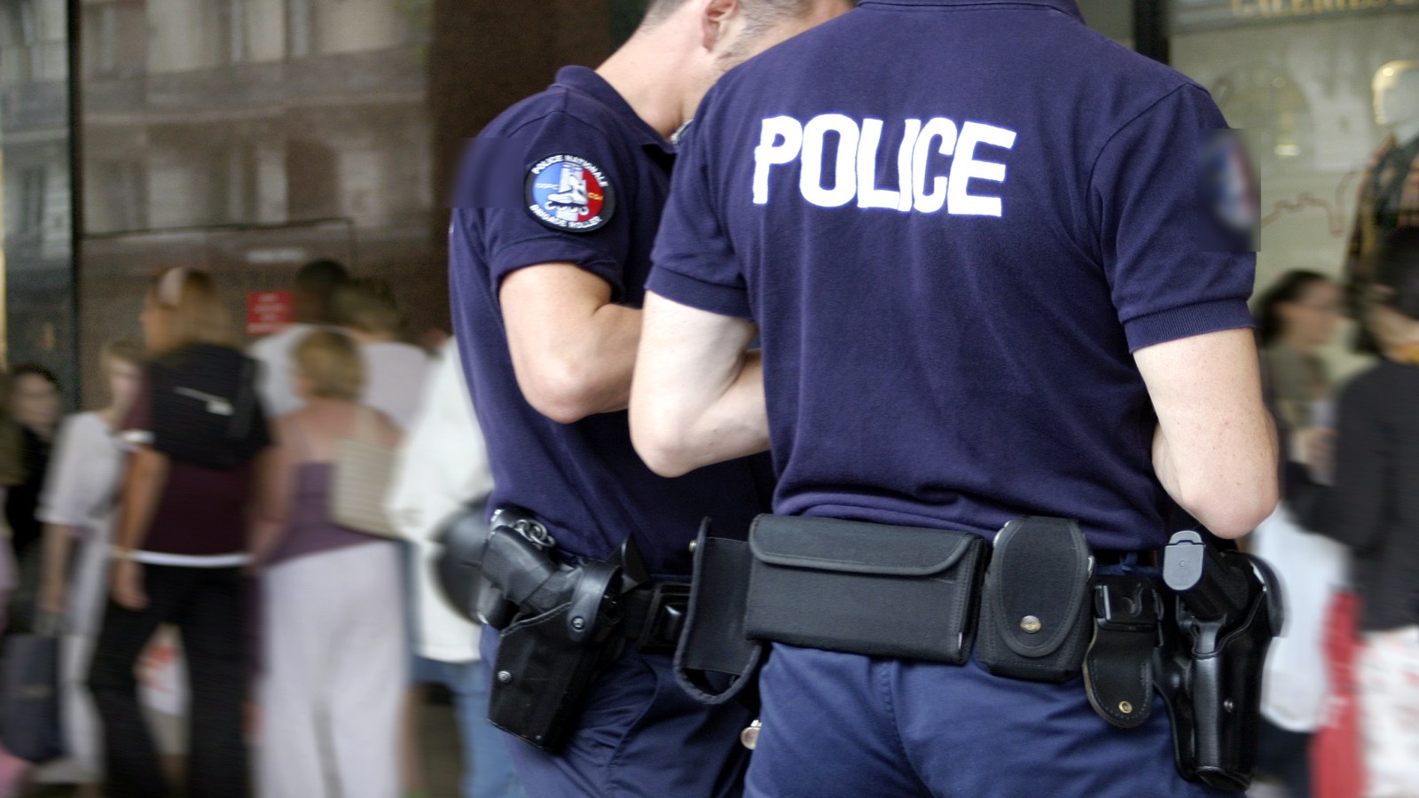 Police officers on patrol — duty equipment