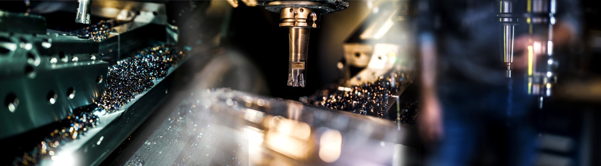 CNC machining centre cutting metal, chips on the bed