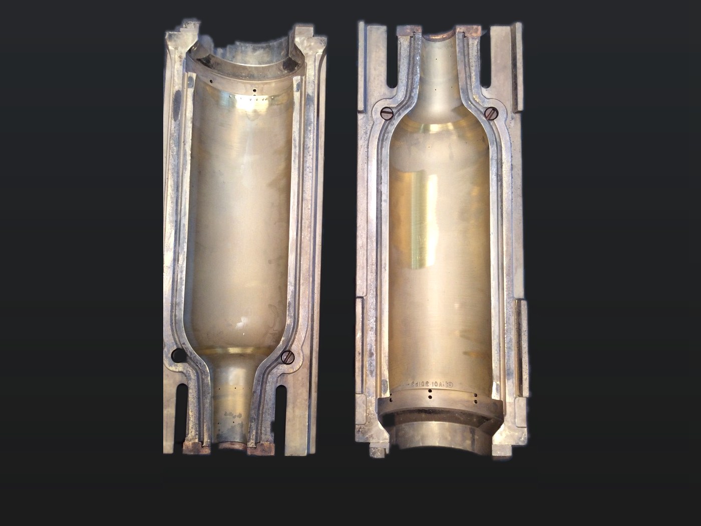 Glass bottle blow-mould halves, cleaned