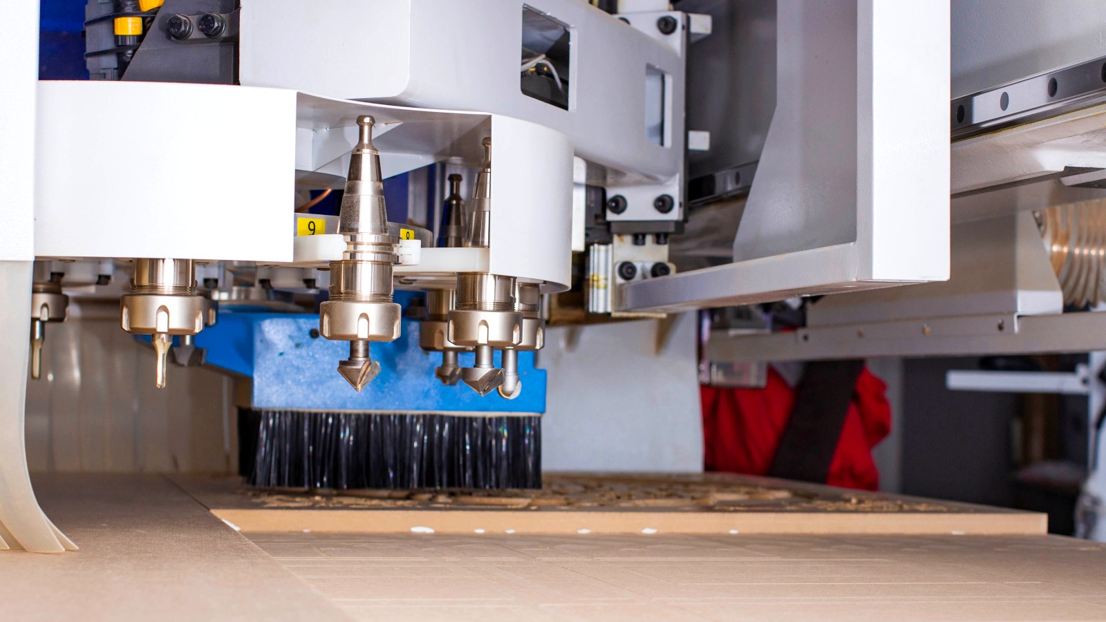 CNC router head over a timber panel