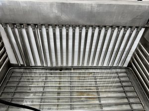 Bank of Solo 360 rods retrofitted along a tank wall