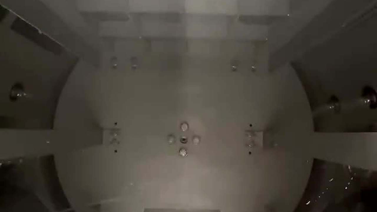 Rinse jets firing inside an UltraWash chamber during pre-despatch testing