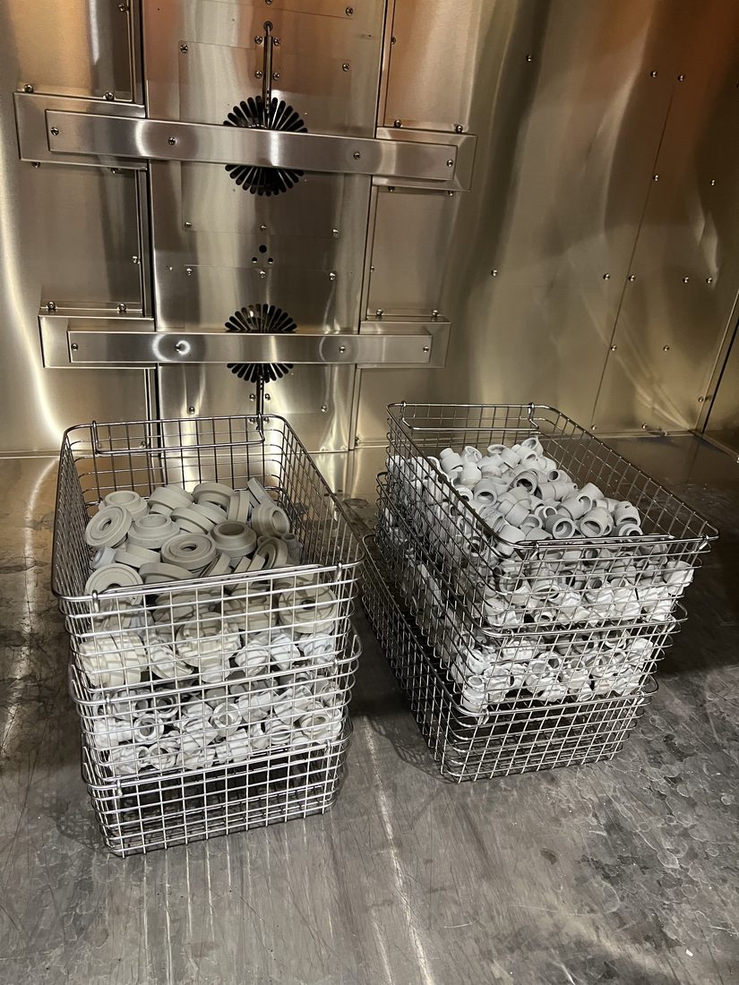 Loaded baskets ready to go into the ultrasonic tank