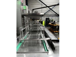Misonics SonoLine automated ultrasonic cleaning line — Basket carriers at transfer height