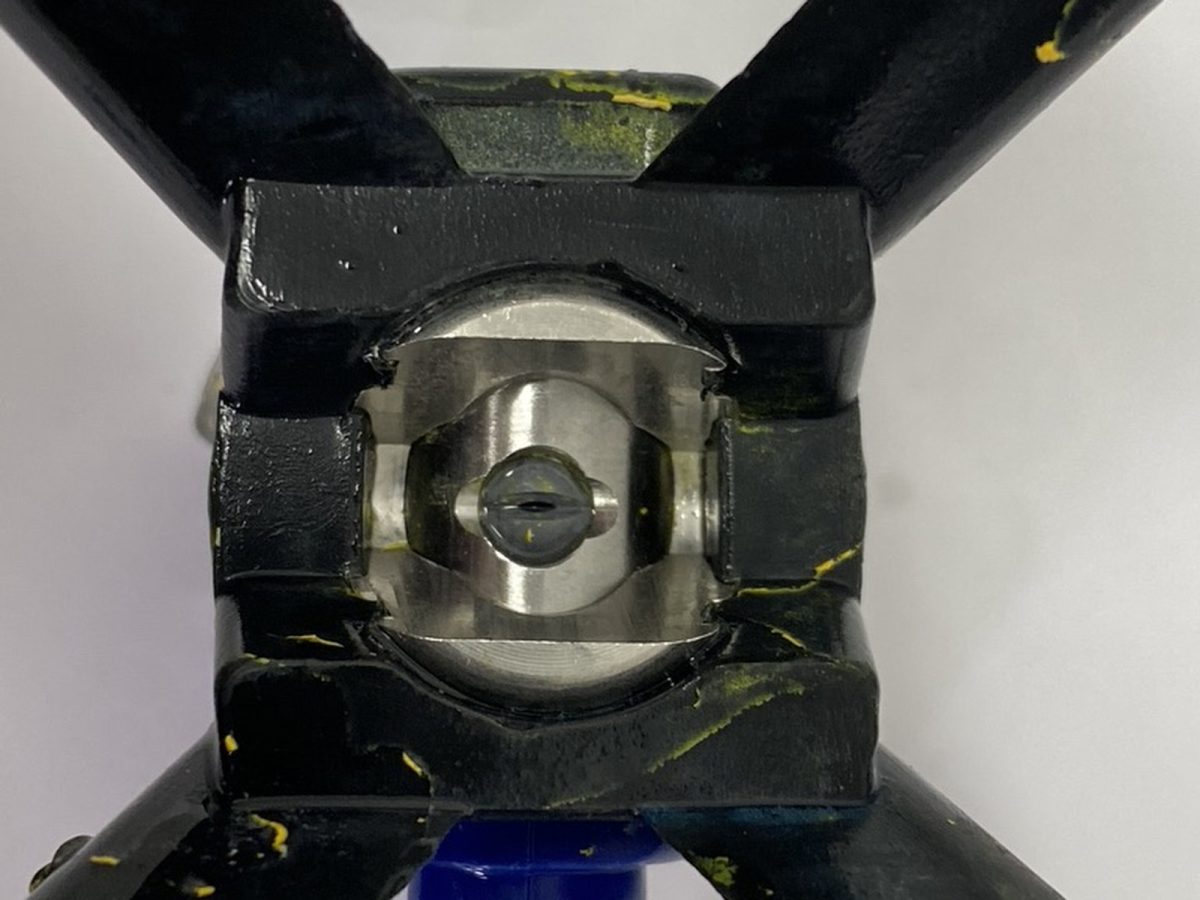 Airless tip and guard — before and after ultrasonic cleaning — after the cycle