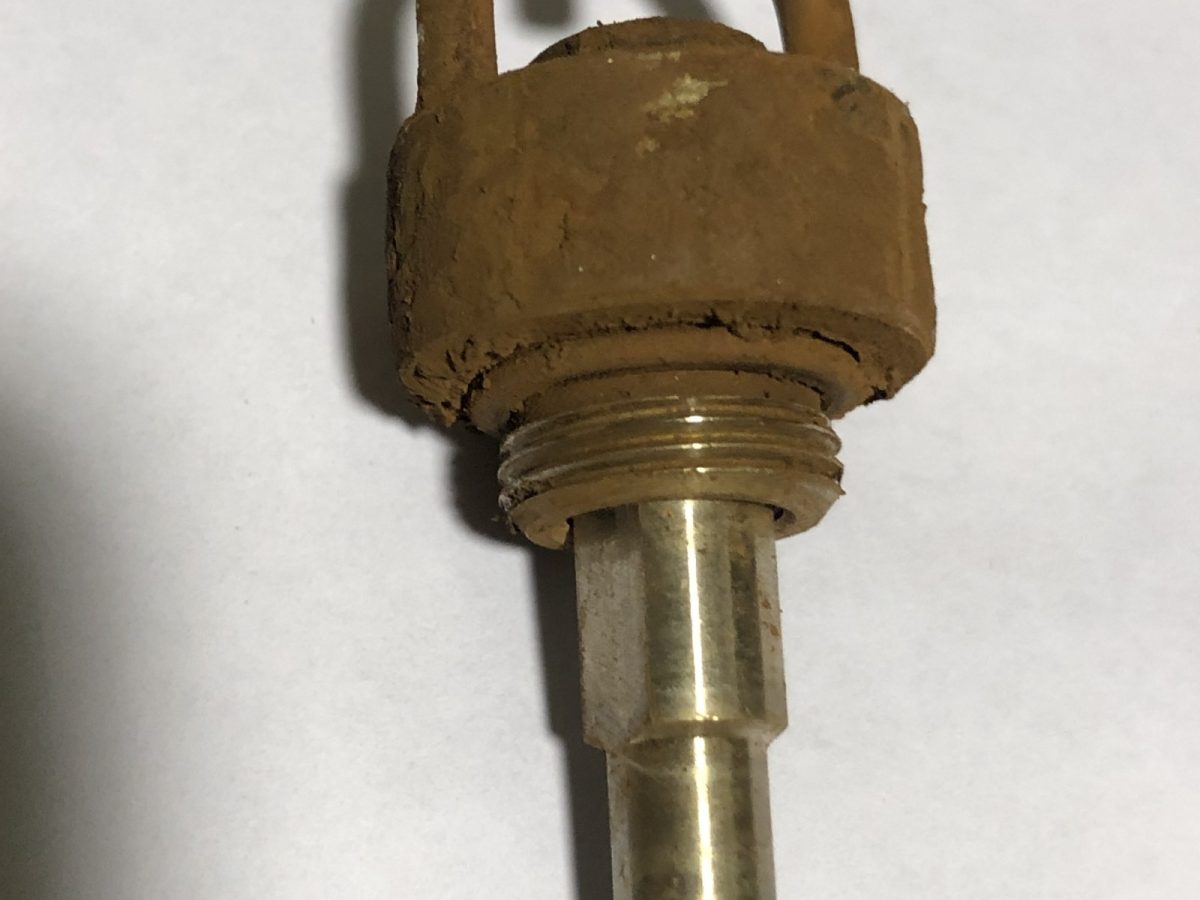Brass dust suppression nozzle &mdash; before and after ultrasonic cleaning &mdash; as received