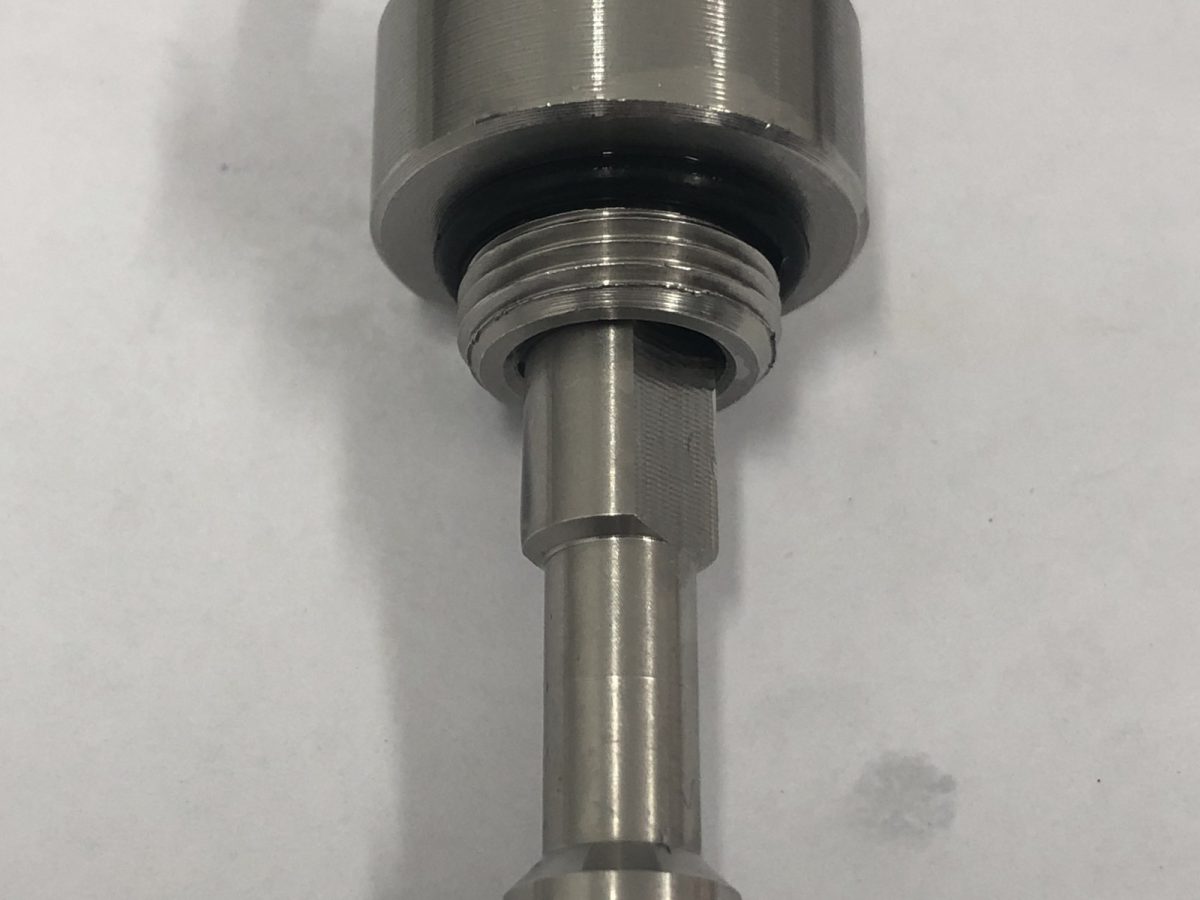 The same nozzle descaled, orifice and swirl chamber clear