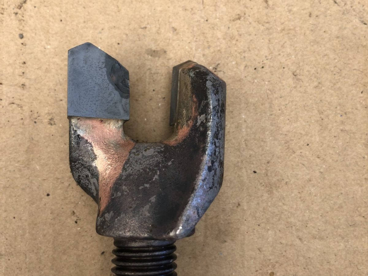 Drill pick holder, as recovered — before and after ultrasonic cleaning — after the cycle