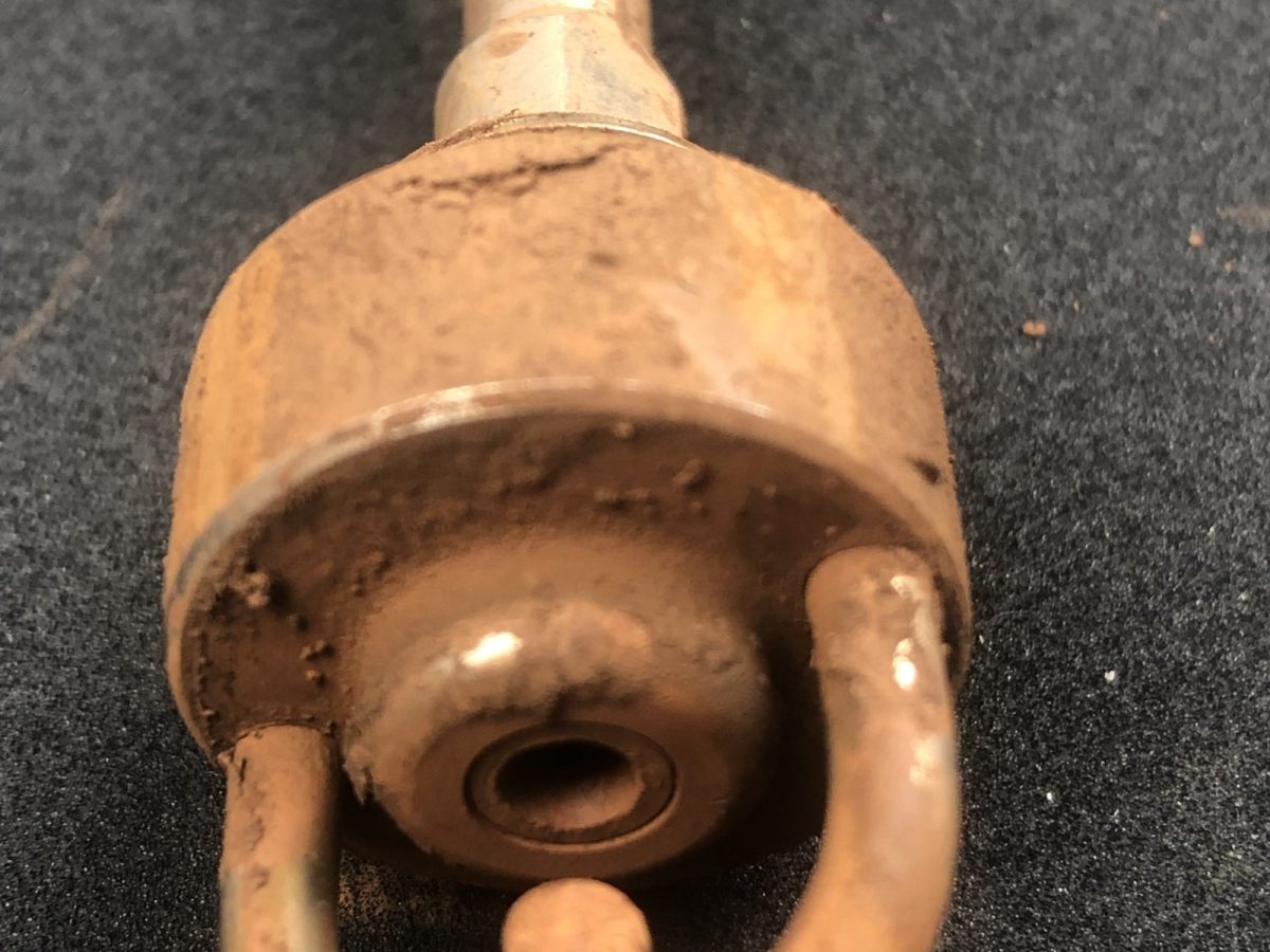 Nozzle head and orifice — before and after ultrasonic cleaning — as received