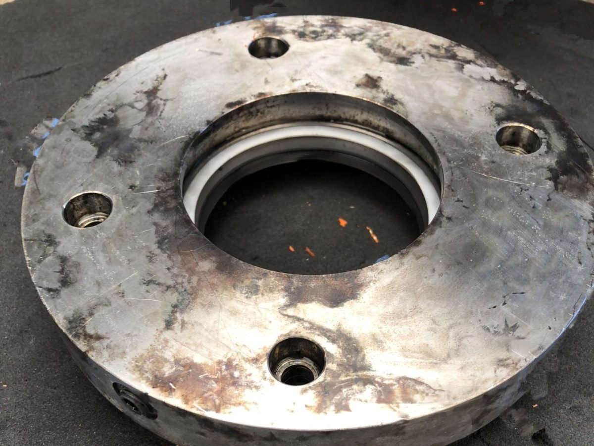 Painted flange plate — before and after ultrasonic cleaning — after the cycle