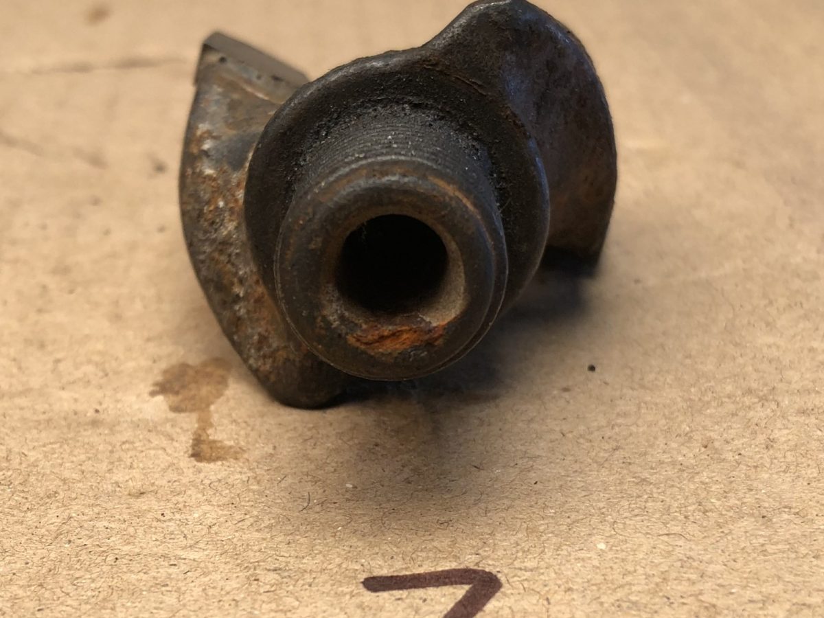 Pick holder bore — before and after ultrasonic cleaning — as received