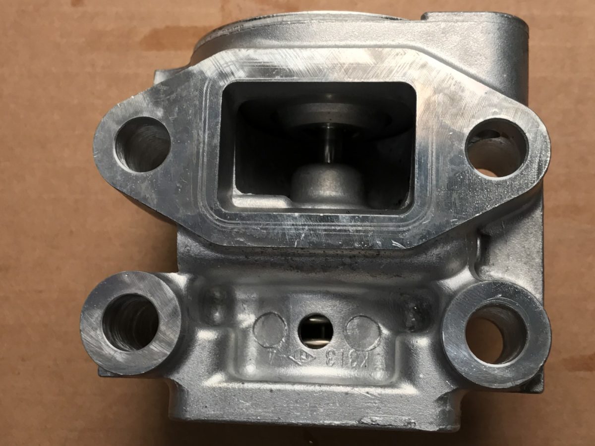 Rectangular inlet port — before and after ultrasonic cleaning — after the cycle