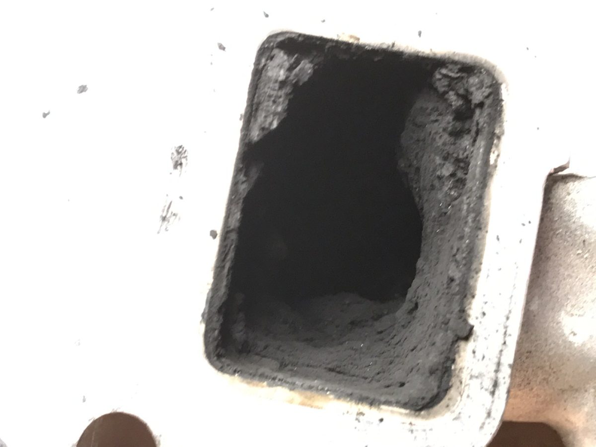Rectangular inlet port — before and after ultrasonic cleaning — as received