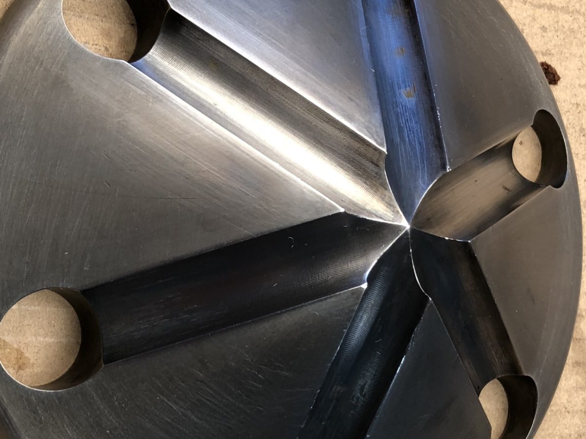 Slotted die cone — before and after ultrasonic cleaning — after the cycle
