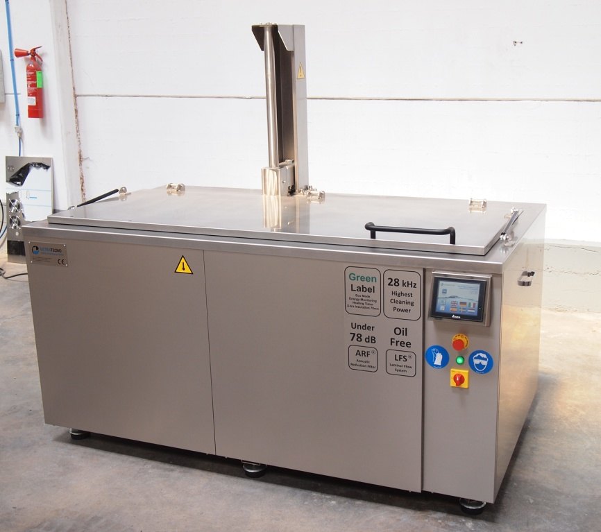 An UltraTecno ACM machine installed on a workshop floor with steam extraction ducting