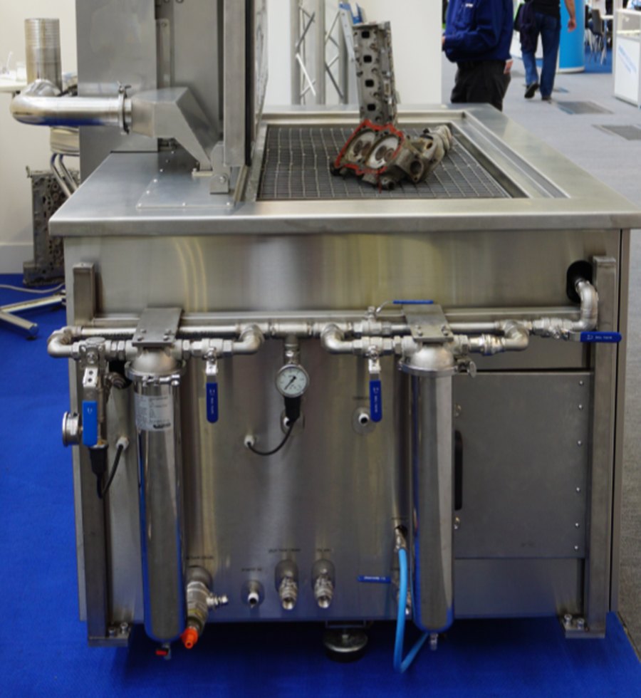 UltraTecno ACM machine with side-mounted filtration housings and gauges