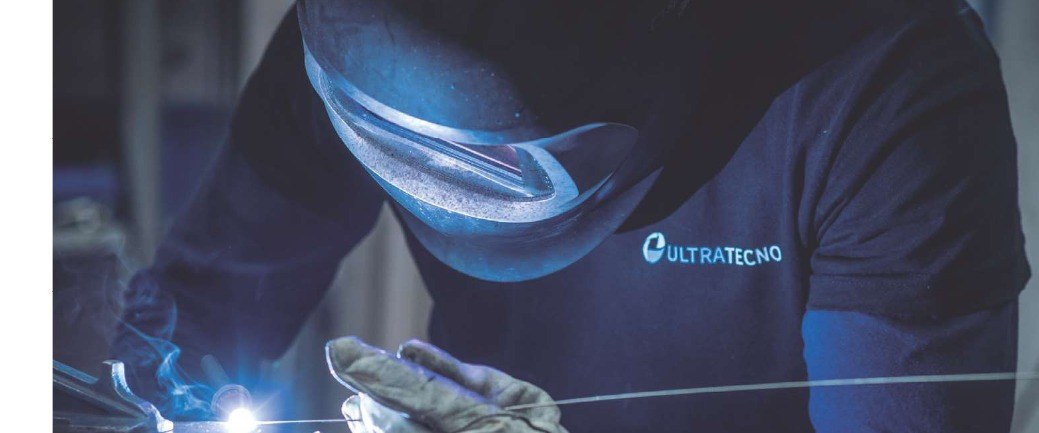 An UltraTecno technician TIG welding a stainless steel tank seam