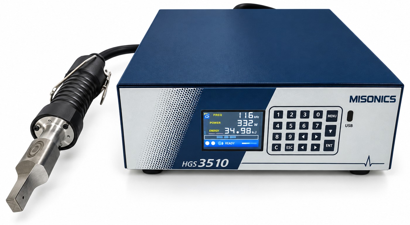 A Misonics hand-held ultrasonic welding gun on its lead, plugged into an AHG-3510 generator