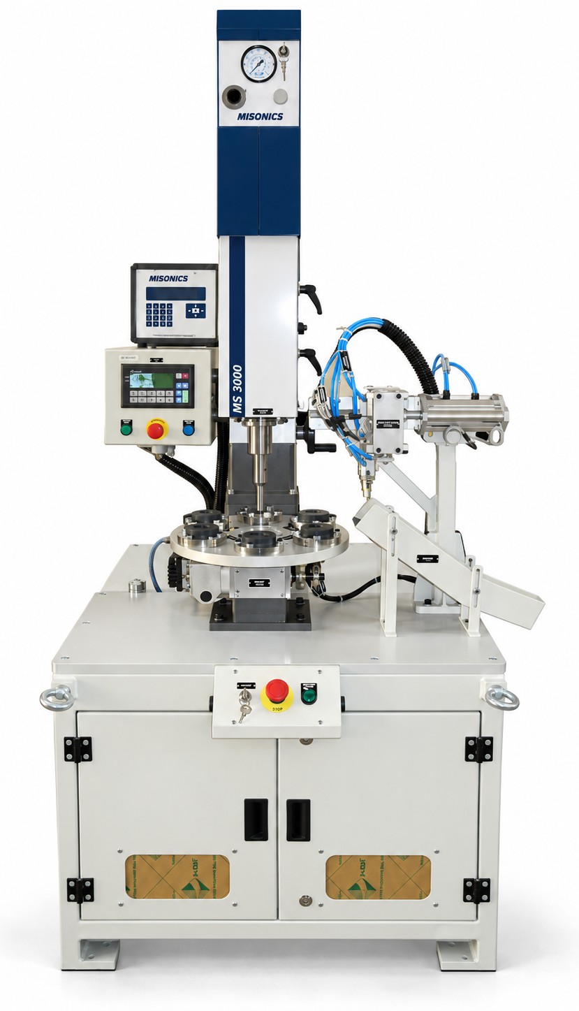 A Misonics MS 3000 welding head on a six-station rotary indexing table with a welded-part ejection mechanism, guarding and a PLC panel